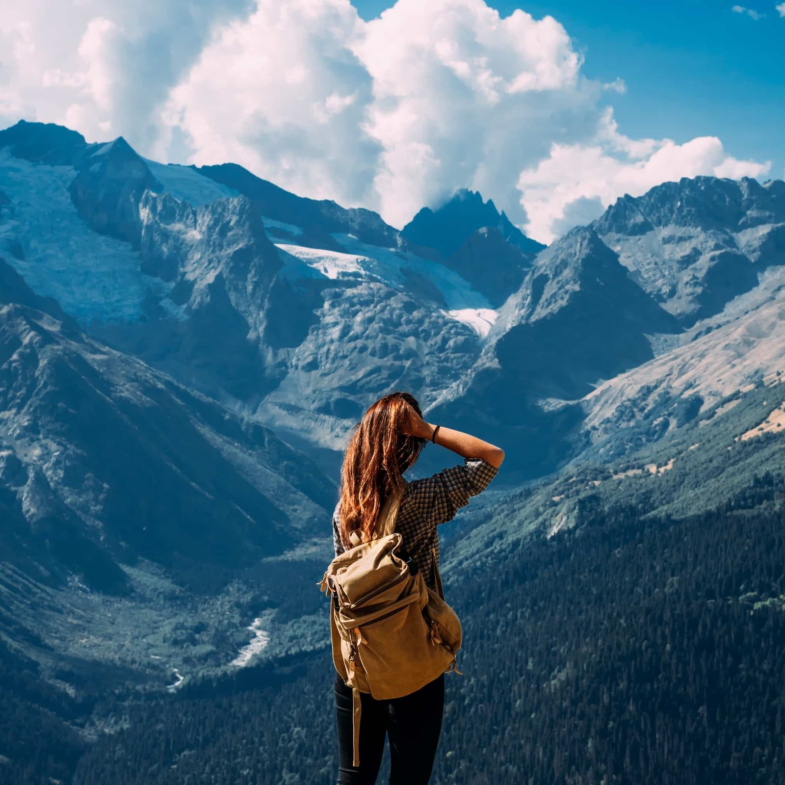 a-woman-is-traveling-in-caucasus-russia-mountain-2026-03-09-01-49-49-utc.jpg